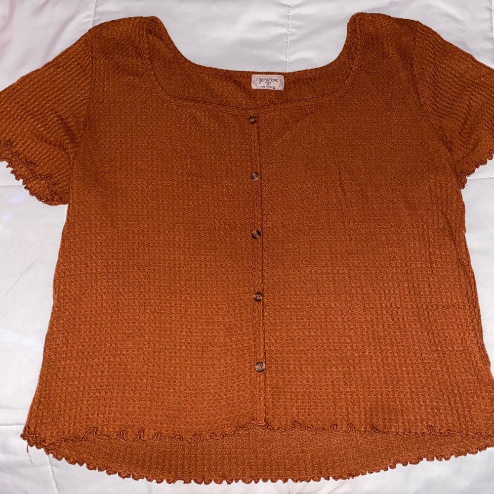Burnt orange short sleeve lettuce cut shirt